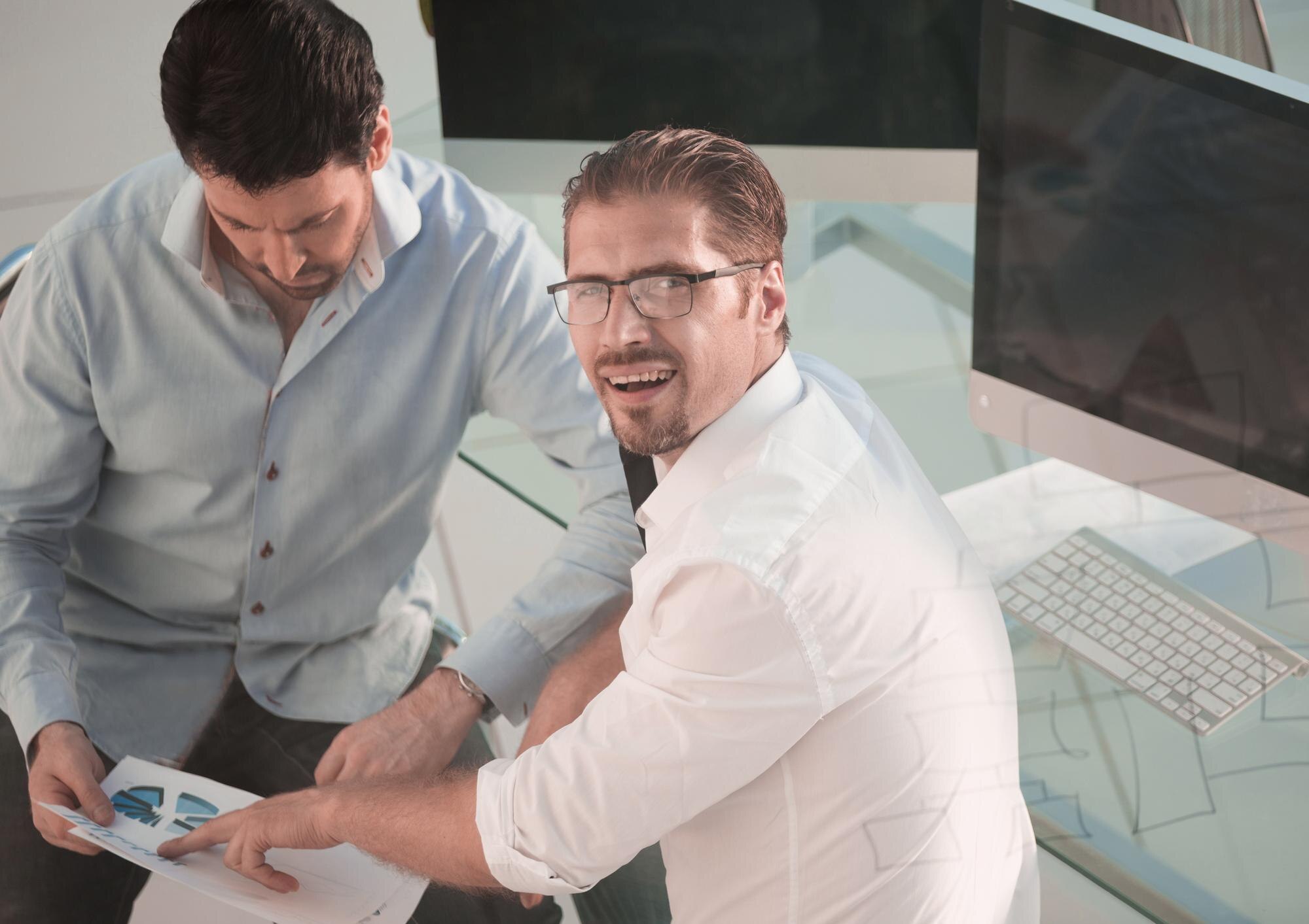 top viewemployees discussing financial charts 252847 32994